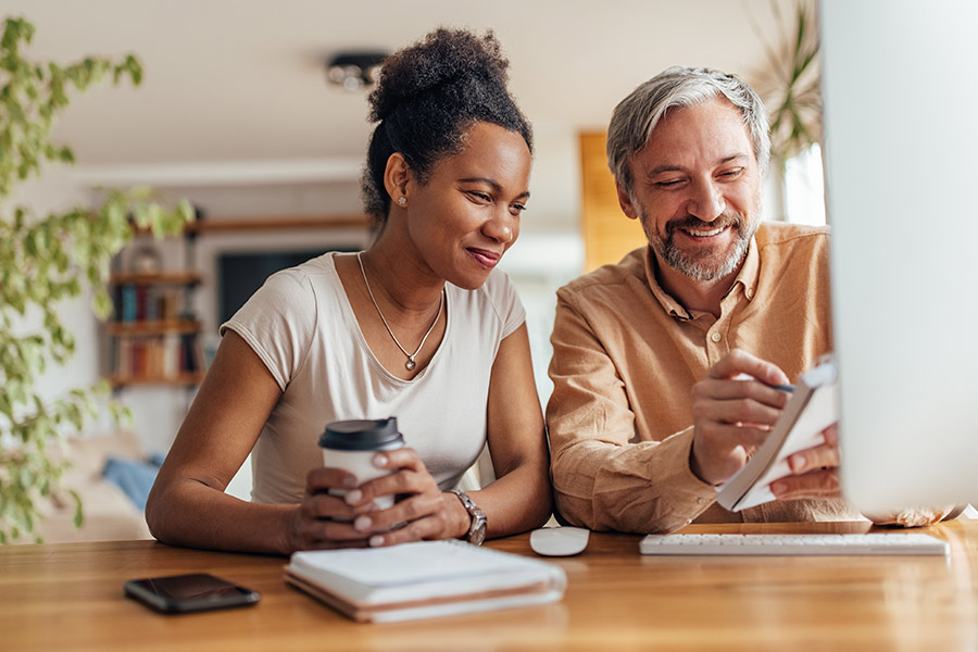 A Couple Reviewing Finances as a New Year's Resolution