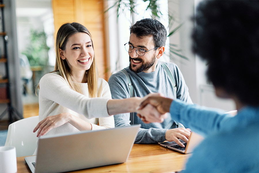 Couple Receiving Credit Counseling - Check `n Go
