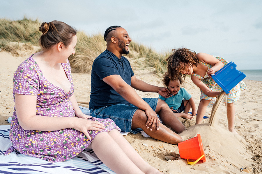 Family at the Beach on Spring Break - Check `n Go