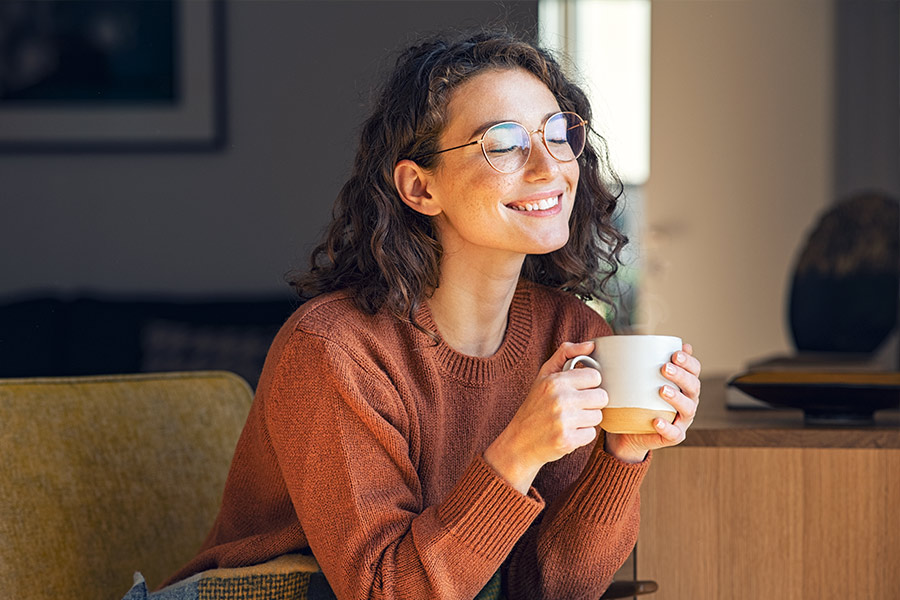 Single Woman Drinking Coffee - Check `n Go