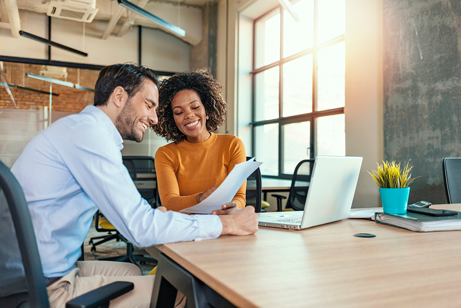 Man and woman discussing finances.