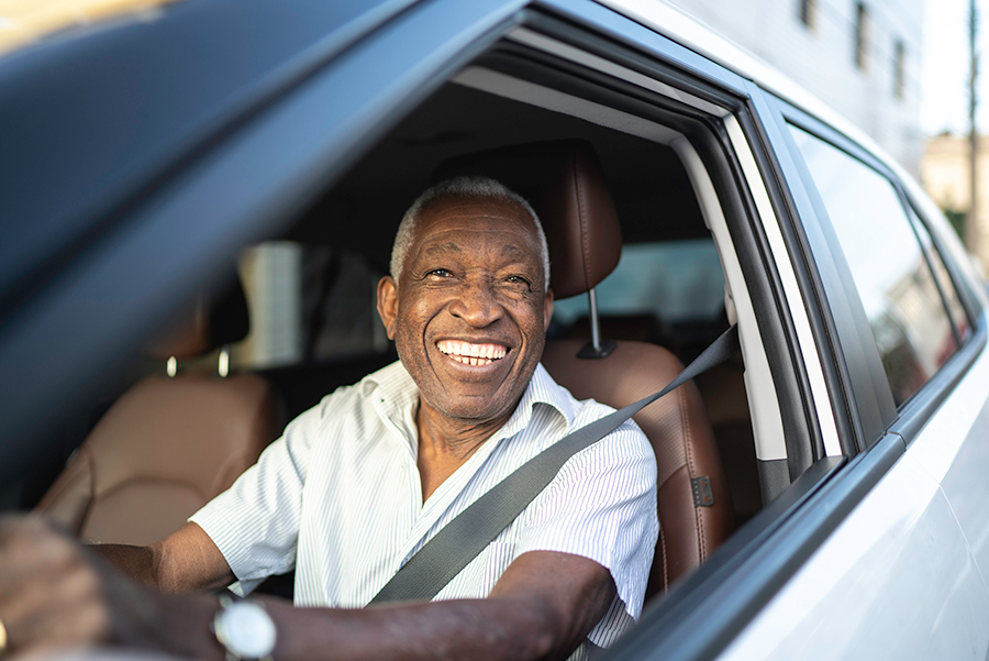 Man driving a car.