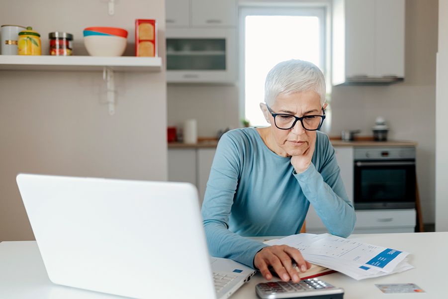 Woman using a calculator