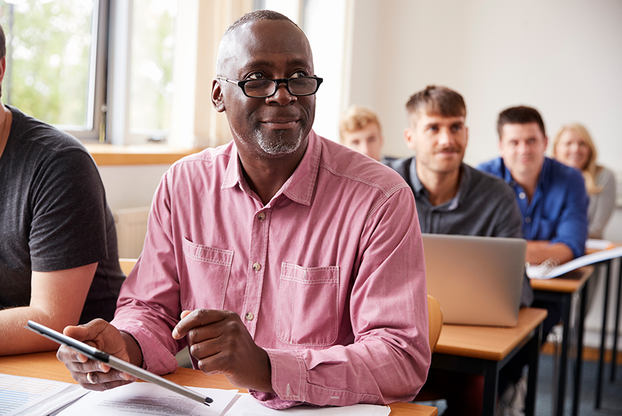 Adult man in a college class