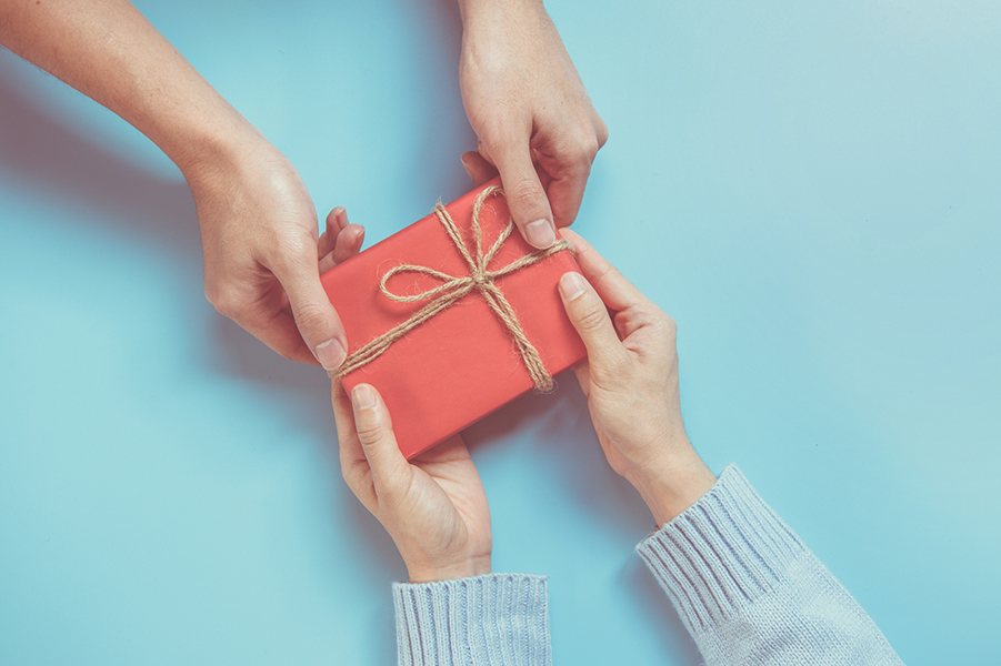 Hands holding a gift